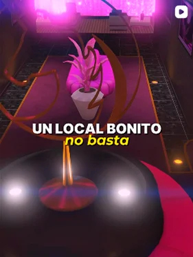 Interior de un local iluminado con neones rosas